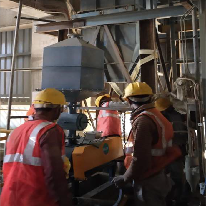 Techedge team working with industrial machinery at Bengaluru facility